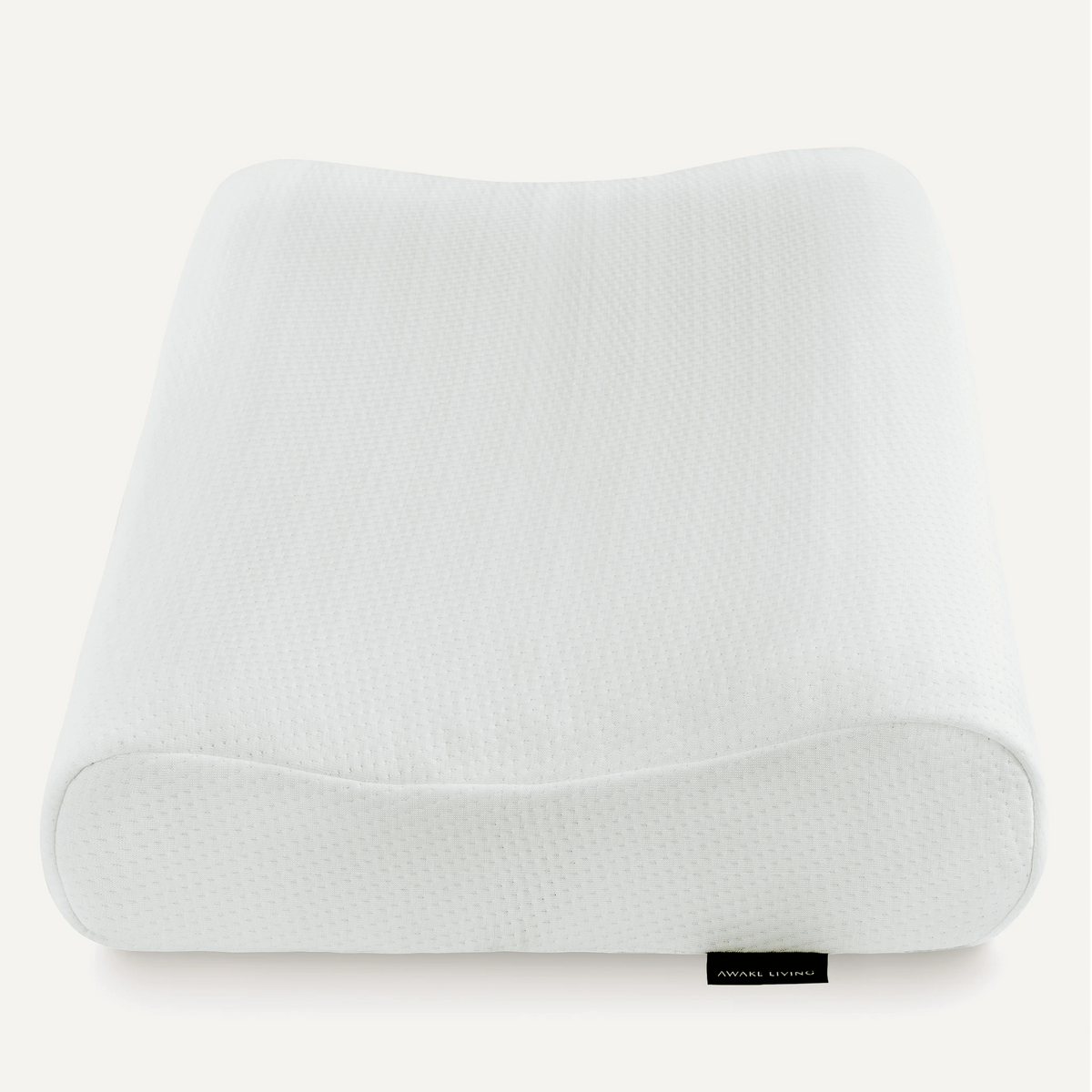 TPE 高密度涼感記憶枕產品照片，套上純白枕套側拍顯示曲線